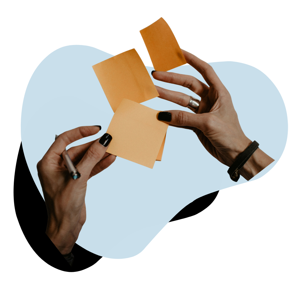 hands in blobs holding post it notes