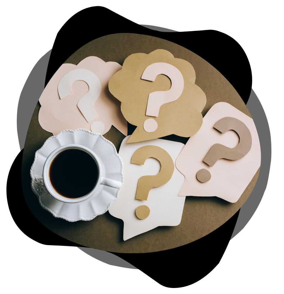 cut out question marks and a cup of coffee
