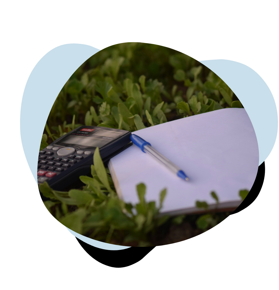 calculator, pad and pen